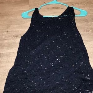 Tank top, see through, really dressy and cute.